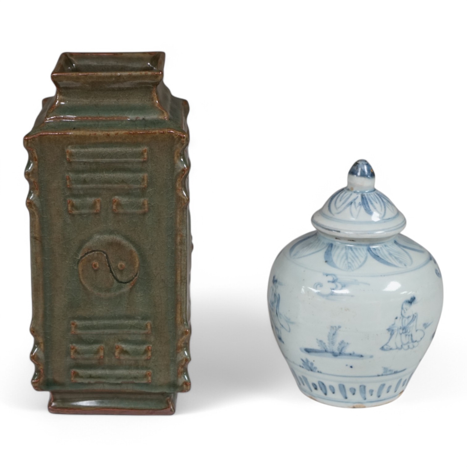 A Chinese celadon glazed cong vase and a blue and white jar and cover, tallest 22cm. Condition - good